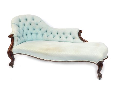 A 19thC show frame chaise longue, the button back upholstered in pale blue fabric with scrolling arms and legs, raised on cas