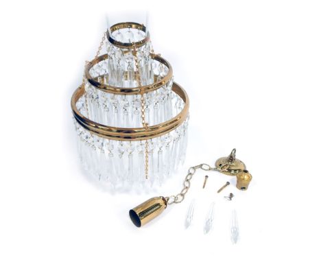 A 20thC brass and cut glass ceiling light, formed as three tiers, various droplets, 22cm diameter.