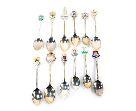 Twelve silver and enamel commemorative tea or coffee spoons, shield and landmark terminals to include Boston Stump, Stratford