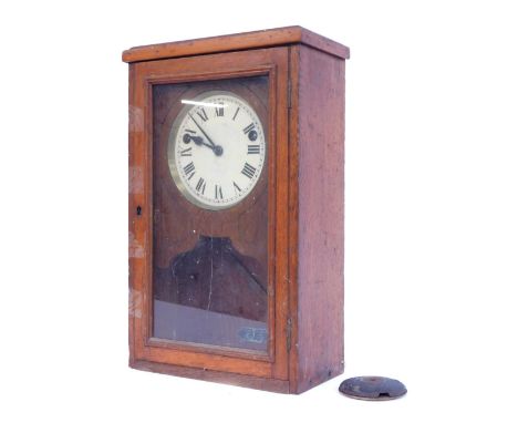 An early 20thC oak cased wall clock, the circular enamel dial bearing Roman numerals, eight day movement, with pendulum, the 