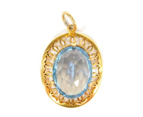 A 9ct gold pendant, with central light blue stone, possibly a topaz, in a pierced outer frame, one claw missing, 2.5cm x 1.5c
