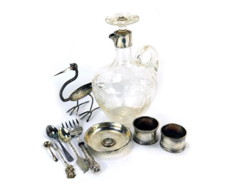 A Victorian cut glass claret jug, with silver mount and spout, Sheffield 1900 (AF), together with two silver napkin rings, sa