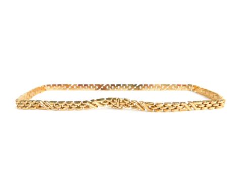 A 9ct gold necklace, Aztec design, set with slide clip and clasp, 43cm long, 29.6g all in. 