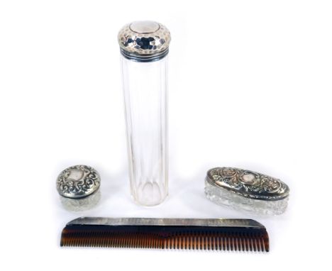 An Edward VII cut glass cylindrical jar with a silver screw lid, London 1906, two further cut glass toilet jars with silver l