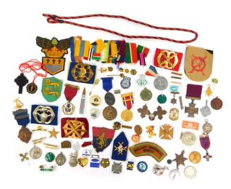 Various medals, medallions, cloth badges etc., to include a replica Victoria Cross, Boys Brigade enamel badge, Surrey County 