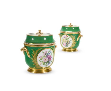 A PAIR OF PARIS PORCELAIN (FEUILLET) GREEN-GROUND AND GILT FRUIT COOLERS AND COVERS CIRCA 1830 Painted with panels of flowers