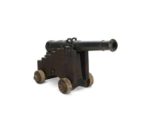 A GEORGE III CAST BRONZE 'TWO-POUNDER' CANNON   T ENGLISH & CO, LONDON, DATED 1775 The multi-stage ring-moulded barrel with s