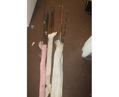 THREE VINTAGE FISHING RODS