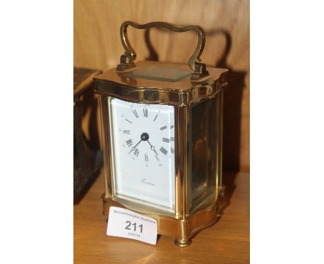 A BRASS EURO TIME CARRIAGE CLOCK