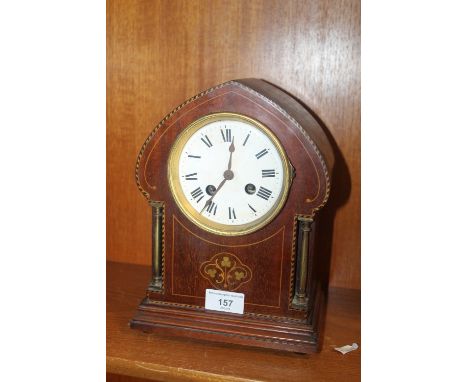 AN EDWARDIAN MAHOGANY FRENCH MANTEL CLOCK
