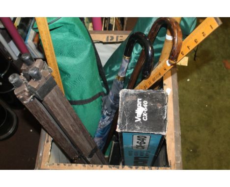 A QUANTITY OF ASSIORTED UMBRELLAS, CAMPING CHAIR, CAMERA TRIPOD ETC.