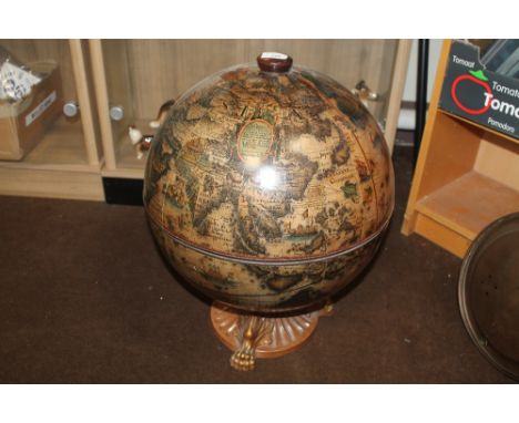 A RETRO COMBINATION GLOBE/DRINKS CABINET AND CONTENTS