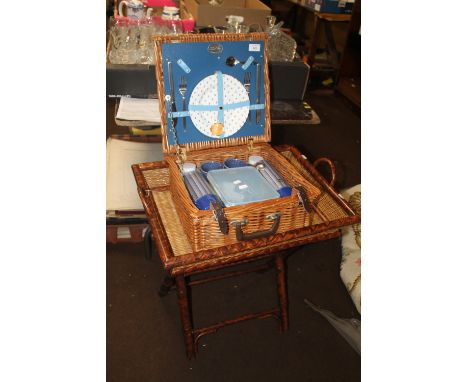 A BREXTON COLLECTION WICKER PICNIC HAMPER TOGETHER WITH A WICKER SERVING TRAY ON STAND