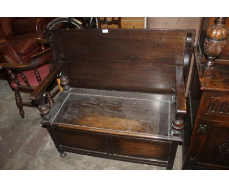 AN OAK MONKS BENCH W 99CM