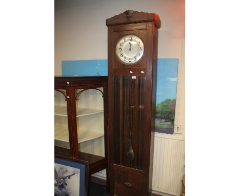 AN OAK CASED ART NOUVEAU LONGCASE CLOCK WITH TRIPLE WEIGHT AND PENDULUM H 212CM