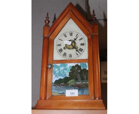 A PINE MANTEL CLOCK WITH PAINTED PANEL