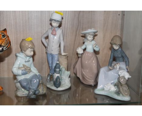 FOUR NAO FIGURES TO INCLUDE A SEATED GIRL WITH RABBITS, BOT WITH DOG ETC.