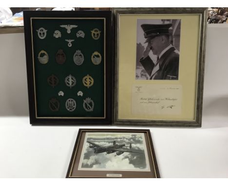 Three framed pieces of Militaria interest, including an Adolf Hitler portrait with a certificate or letter of relevance, a gr