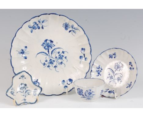 A Worcester porcelain lobed dish, blue and white painted in the Gilliflower pattern, hatched crescent C mark verso, dia. 21.5