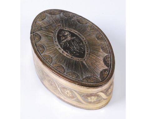 A George III gilt metal oval snuff-box, the engine turned hinged cover with navette shaped cartouche having engraved armorial