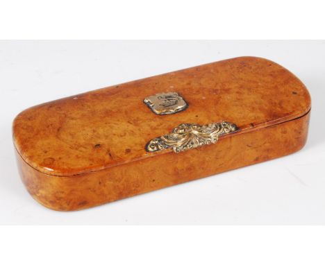 A 19th century burr wood snuff-box, the hinged cover set with embossed yellow metal thumb-piece and engraved armorial cartouc