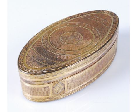 A George III gilt metal snuff-box, of oval form, having engine turned decoration, plain interior, 8cm