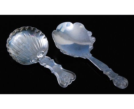 A Victorian silver caddy spoon, having a scallop shaped bowl and further shaped stem, monogrammed S.B, maker Foxall & Co, Bir