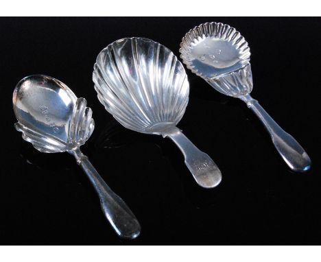 A George IV silver caddy spoon, in the fiddle pattern, having a shell shaped bowl and monogrammed MJL to the stem, maker, Geo
