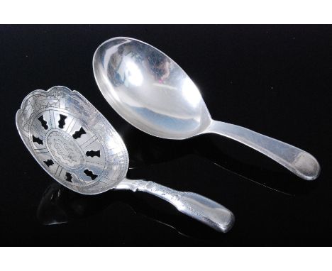 A George III silver caddy spoon, the bowl with bright cut decoration and thistle shaped cut out sections, monogrammed verso I