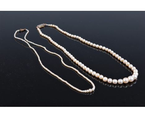 Two 'pearl' necklaces, the first a graduated necklace with 'pearls' between approx. 2.1 - 6.6mm diameter, with unmarked rose 
