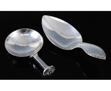 A late Arts & Crafts silver caddy spoon, having a circular spot hammered bowl with square stem and disc terminal, maker Alfre