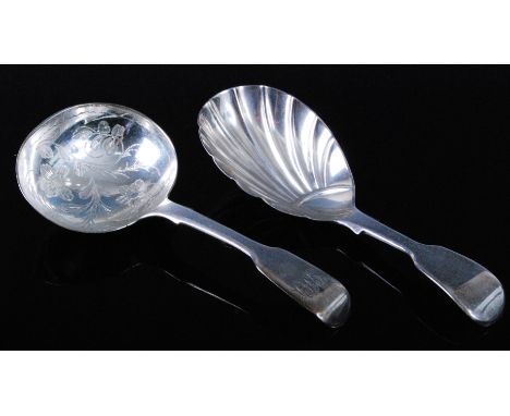 A Victorian silver caddy spoon, the oval bowl with bright cut floral decoration, monogrammed CHL? to the terminal, maker Char