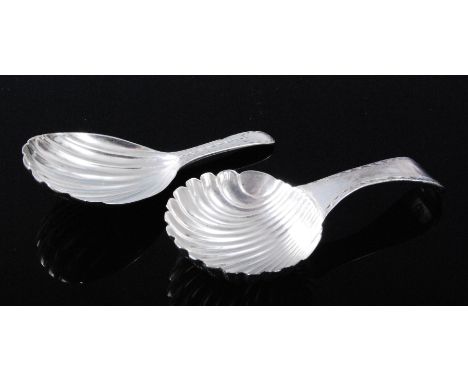 A George III silver caddy spoon, having a shell shaped bowl and bright cut decorated handle, maker Thomas Northcote, London, 