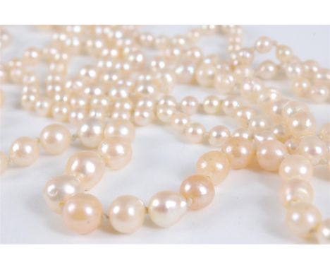 A cultured pearl long rope necklace, the graduated cultured pearls, between approx. 3.4 - 7.2mm, with 14k white gold clasp se