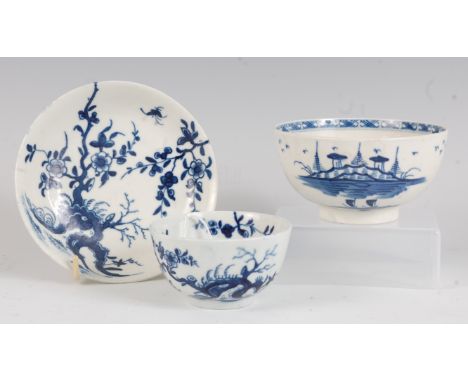 A Worcester porcelain tea bowl and saucer, blue and white painted in the Prunus Root pattern, open crescent mark verso, circa