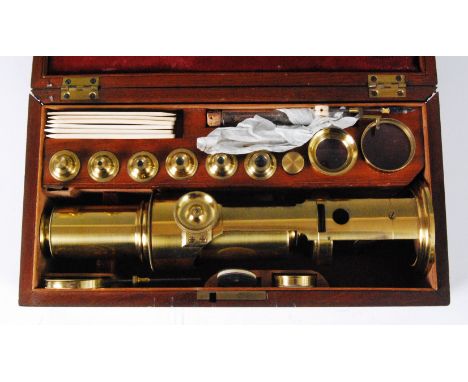 A Davis's Improved large compound microscope, circa 1840, unsigned, contained within original mahogany fitted box, with acces