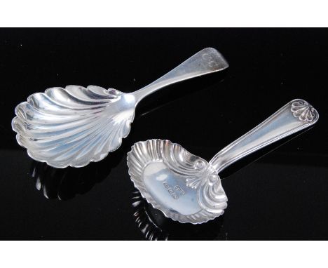 A late Victorian silver caddy spoon, having a shell shaped bowl, the terminal monogrammed CC, maker John Aldwinckle & Thomas 