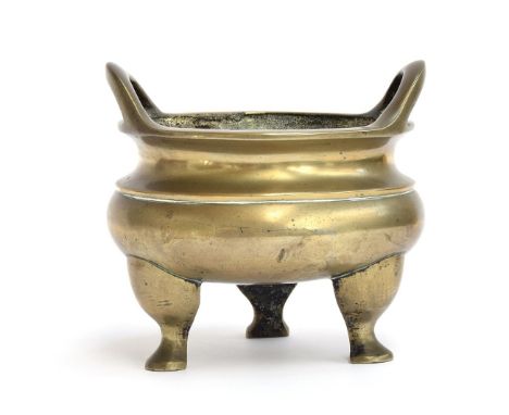 A Chinese brass censer with twin loop handles, with Xuande seal to base, 16.5cm high, approx. 2.5kgProvenance: collected by t