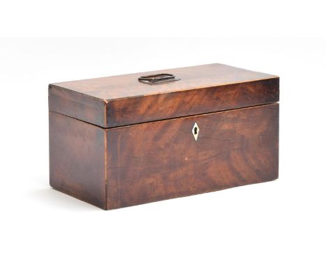 A George III mahogany tea caddy of rectangular form, with blue glass mixing bowl, and two lidded compartments with boxwood st