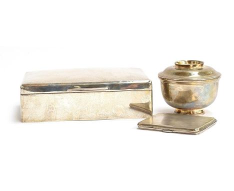 An Edwardian silver cigarette box, London 1907; together with and engine turned cigarette case by Frederick Field, Birmingham