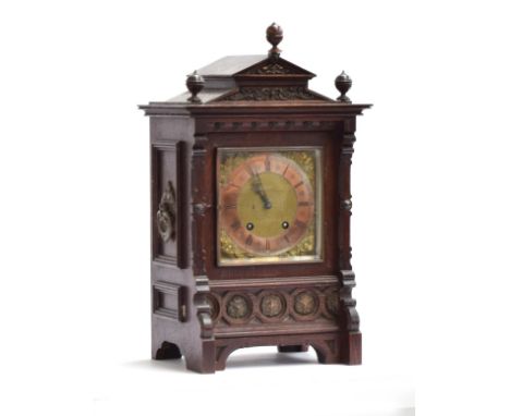 A late 19th century German oak cased mantel clock, by Lenzkirch, architectural case with pediment top, square brass dial with