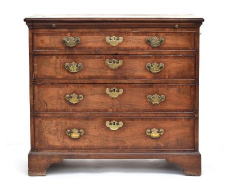 An unusual Victorian chest of drawers, moulded top over blind drawer and a further three graduating drawers, each end with si