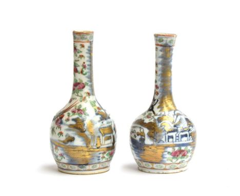 A matched pair of Chinese bottle vases, the first decorated with butterflies and dragons, 16cm high; the other decorated with