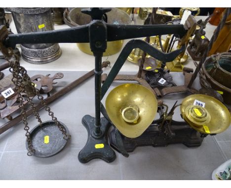 Set of vintage cast iron and brass kitchen scales along with a beam type set of scales (incomplete)