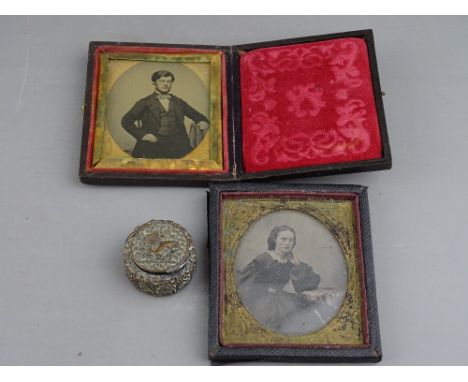 Two deguerriotype portrait studies, one fully cased and a circular antique patch box with interior mirror and dragon with cor