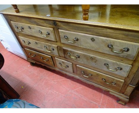 Circa 1830 mahogany Lancashire mule chest of two blind over four opening drawers with reeded side decoration on corner bracke