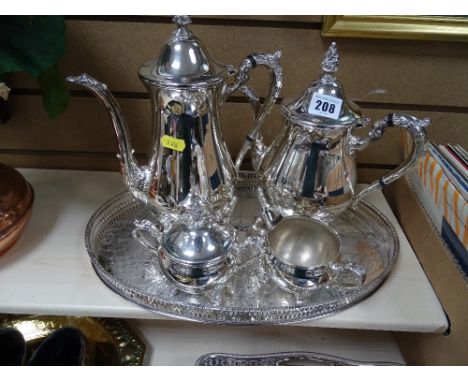 Four piece electroplate tea service and a similar galleried tray
