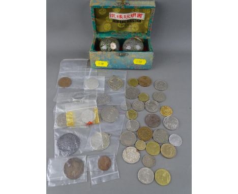 Collection of vintage, mainly foreign coinage and a pair of cased Chinese iron ball bells with cloisonne decoration