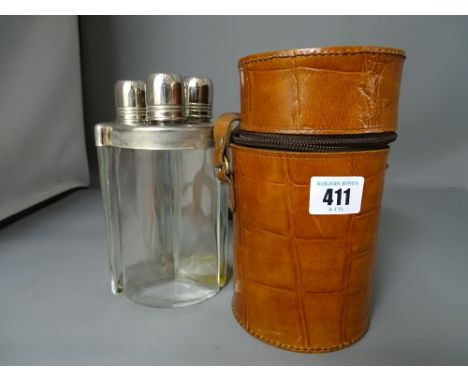 Three part travelling flask set in a leather holder