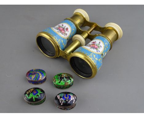 Pair of French enamelled opera glasses (some damage) and four modern silver and enamel pill boxes